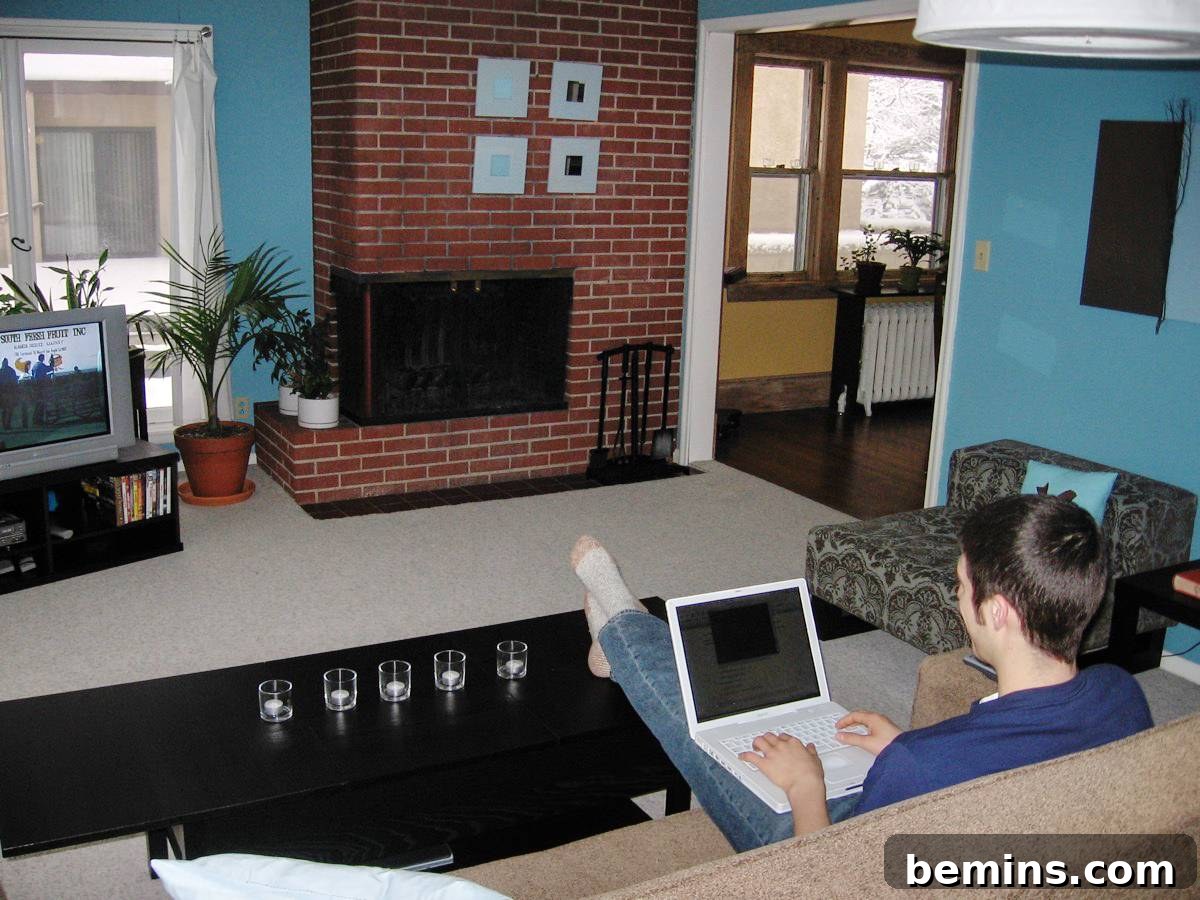 Living room with neon blue walls and quirky decor.