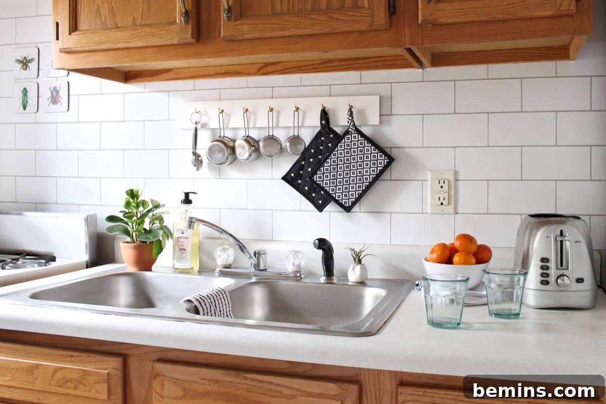 How to create a fake kitchen backsplash using temporary wallpaper.