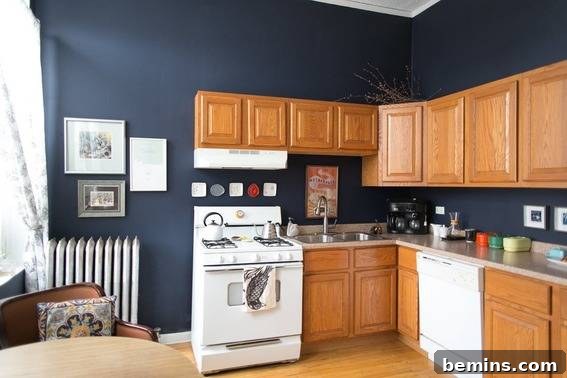 Kitchen with upgraded builder-grade cabinets with nice backsplash