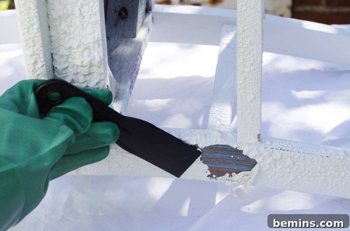 Scraping softened paint from wood furniture