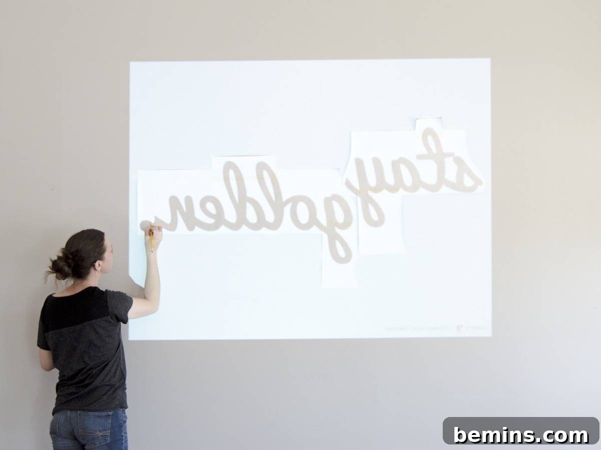 Tracing the projected image onto the vinyl