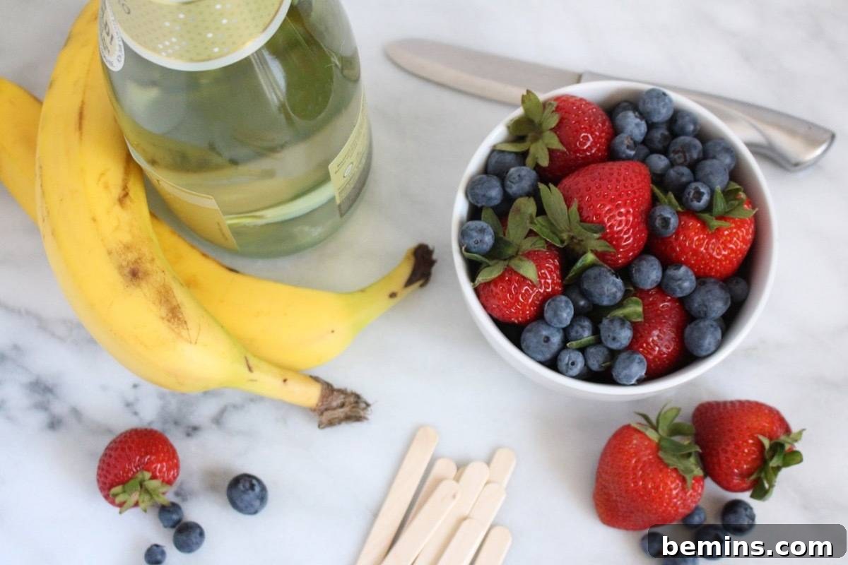 Patriotic Pops: Festive Frozen Treats for Everyone 3 Ingredients for champagne bomb pops: bananas, strawberries, blueberries