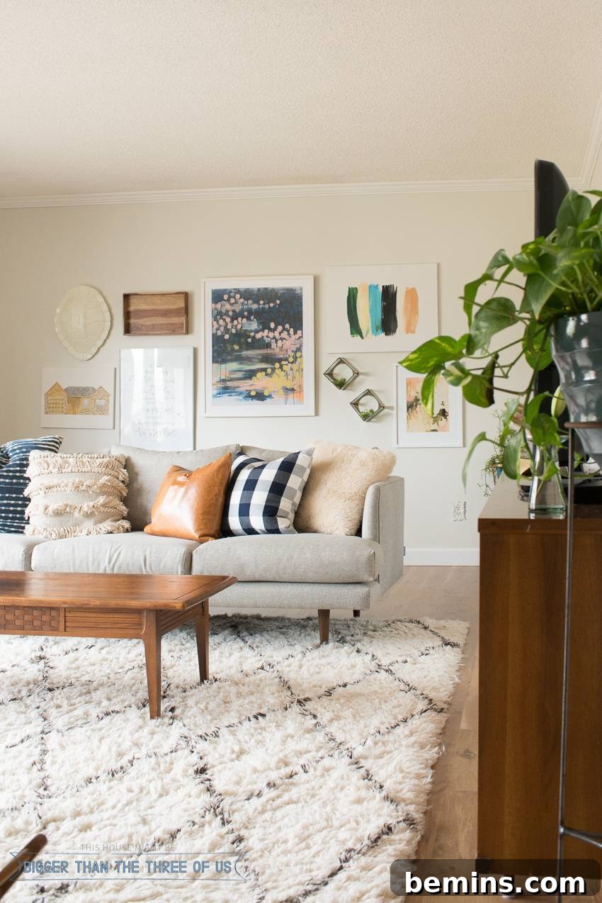 Gallery Wall Behind Couch with Unique Art
