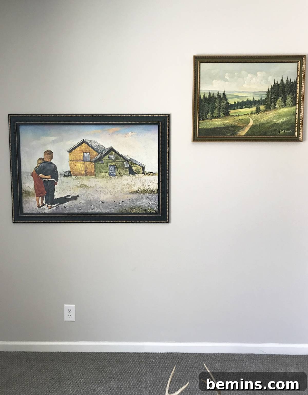 Hanging the anchor pieces of the gallery wall.