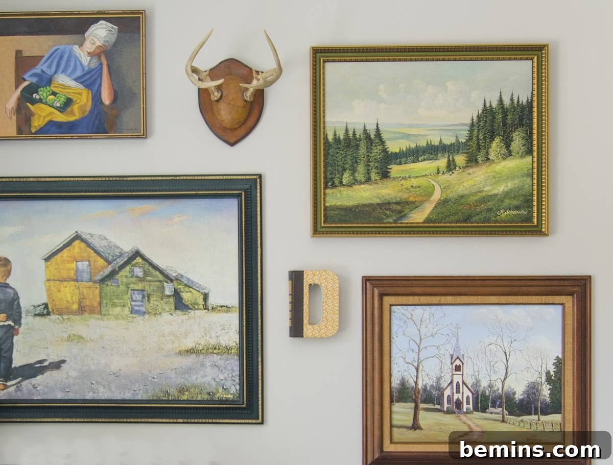 Adding the remaining pieces to the eclectic gallery wall.