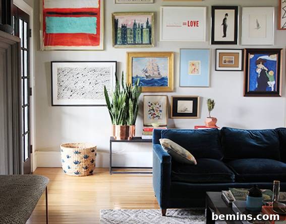 Inspirational gallery wall design featuring a mix of art and a table underneath.
