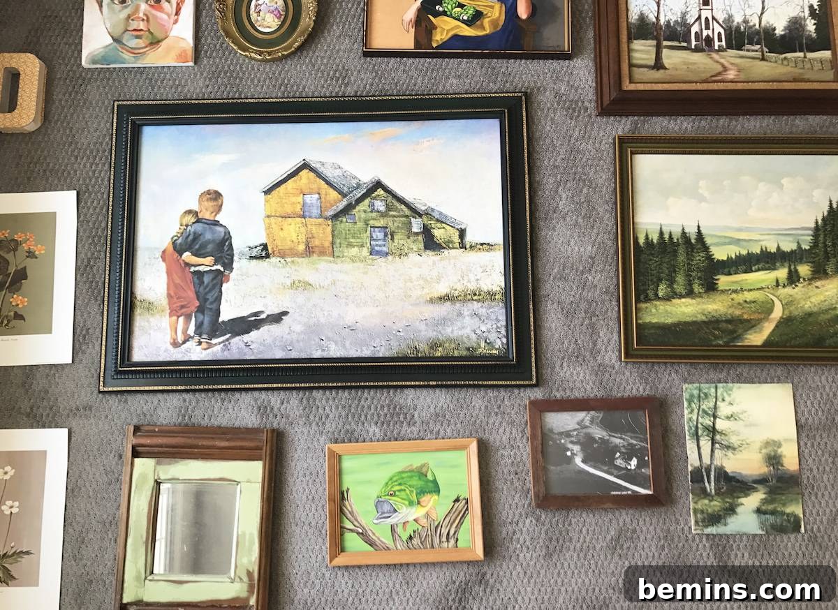 Finding a cohesive element in the art collection for the gallery wall.