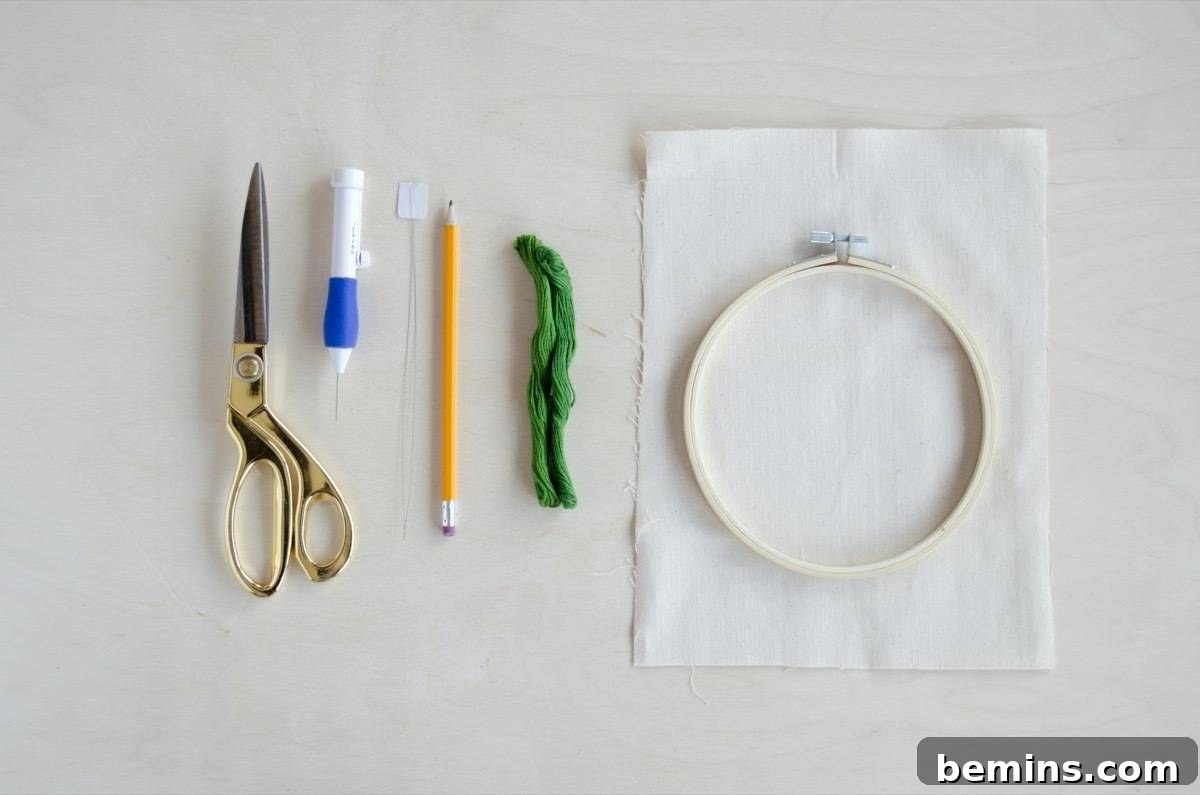 All the necessary materials for creating wall art with punch needle embroidery.