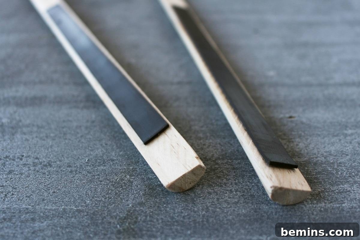 Applying magnetic tape to the wooden trim