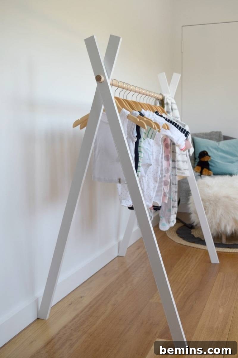 75 DIY Decor Projects to Delight Your Kids 36 A-Frame Clothing Rack