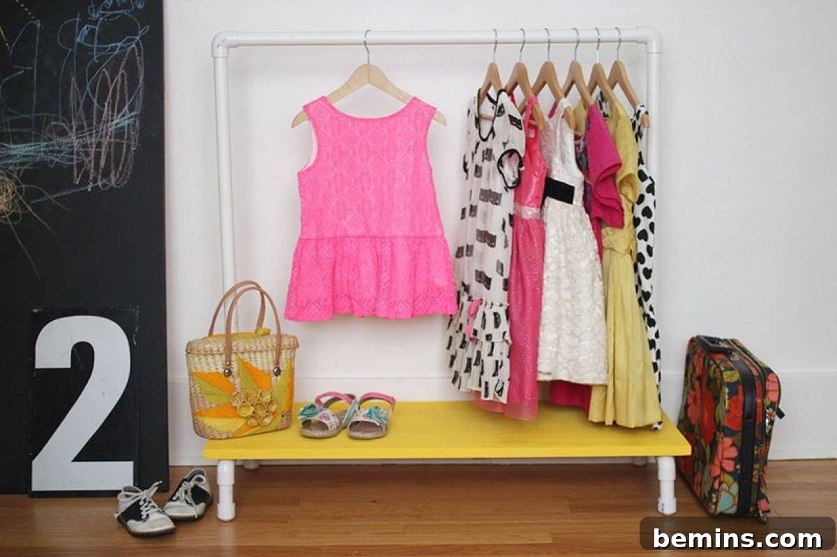 75 DIY Decor Projects to Delight Your Kids 37 Wood and PVC Pipe Clothing Rack