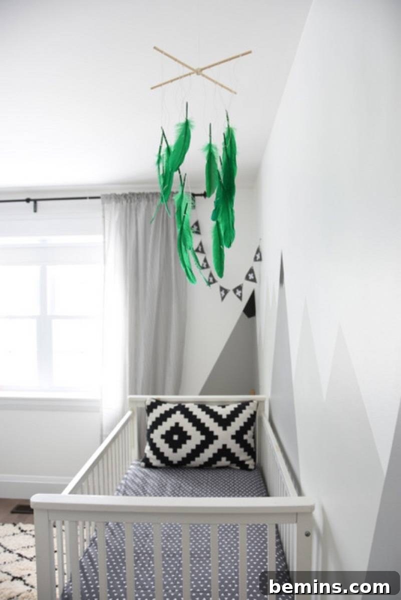 75 DIY Decor Projects to Delight Your Kids 51 Feather Mobile