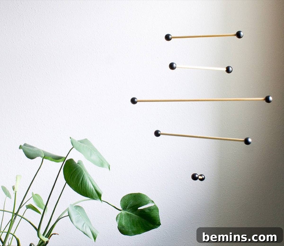 75 DIY Decor Projects to Delight Your Kids 52 Eames-inspired mobile