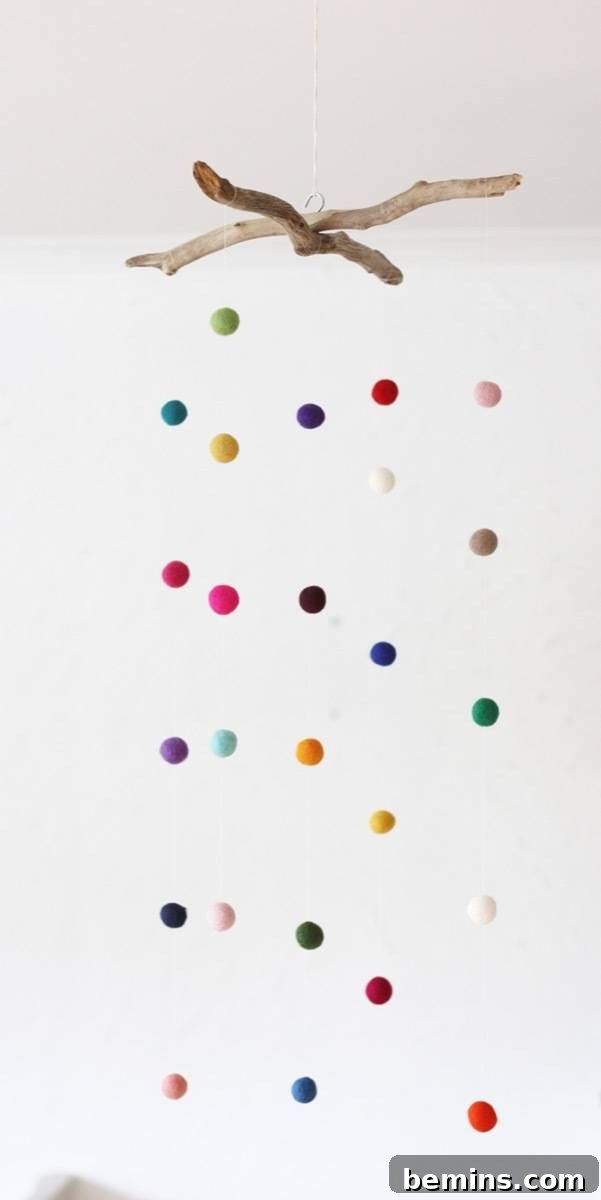 75 DIY Decor Projects to Delight Your Kids 56 Felt ball mobile