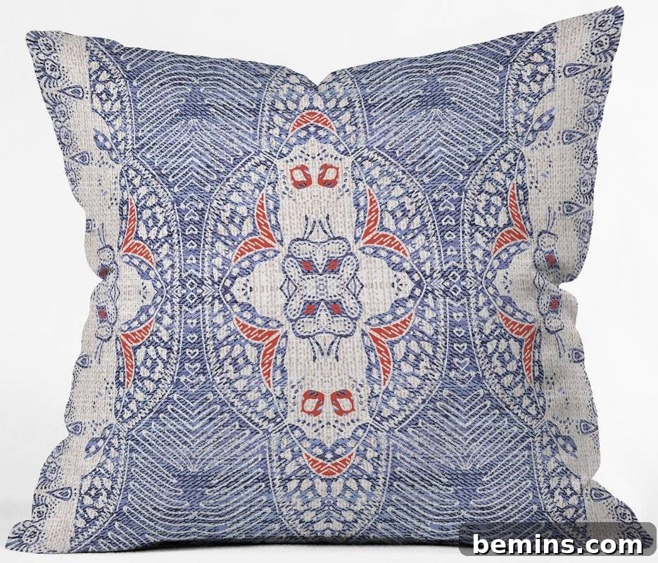 Rust red and blue outdoor pillow