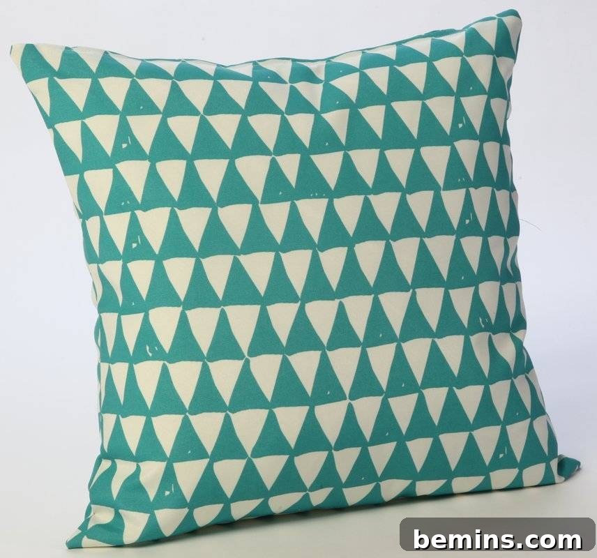 Turquoise triangles outdoor pillow