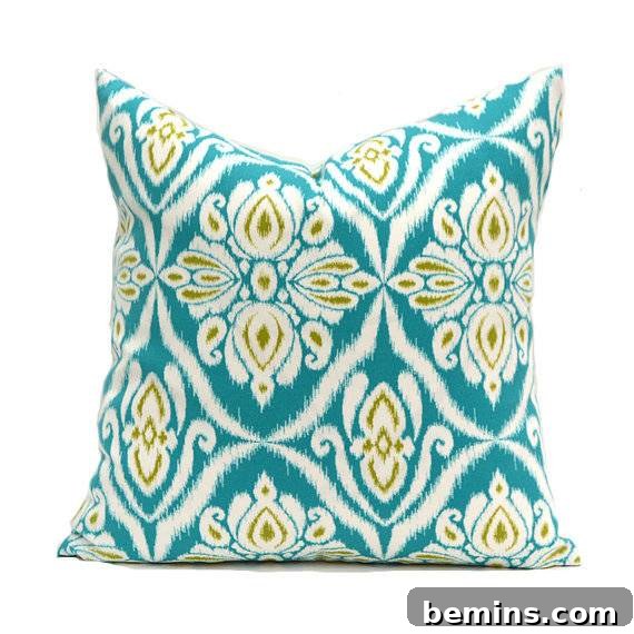 Turquoise and green outdoor pillow