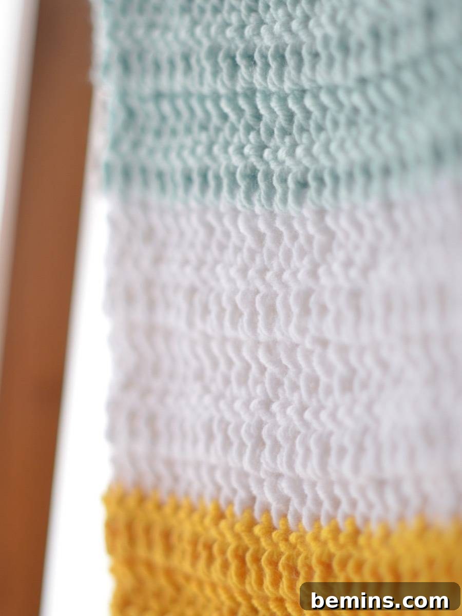 Close up of the crochet stitches on the baby blanket