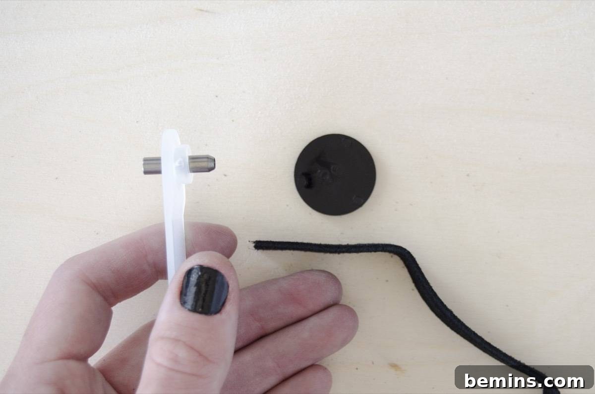 DIY Picnic Backpack - Step 3a: Positioning the awl for hole creation