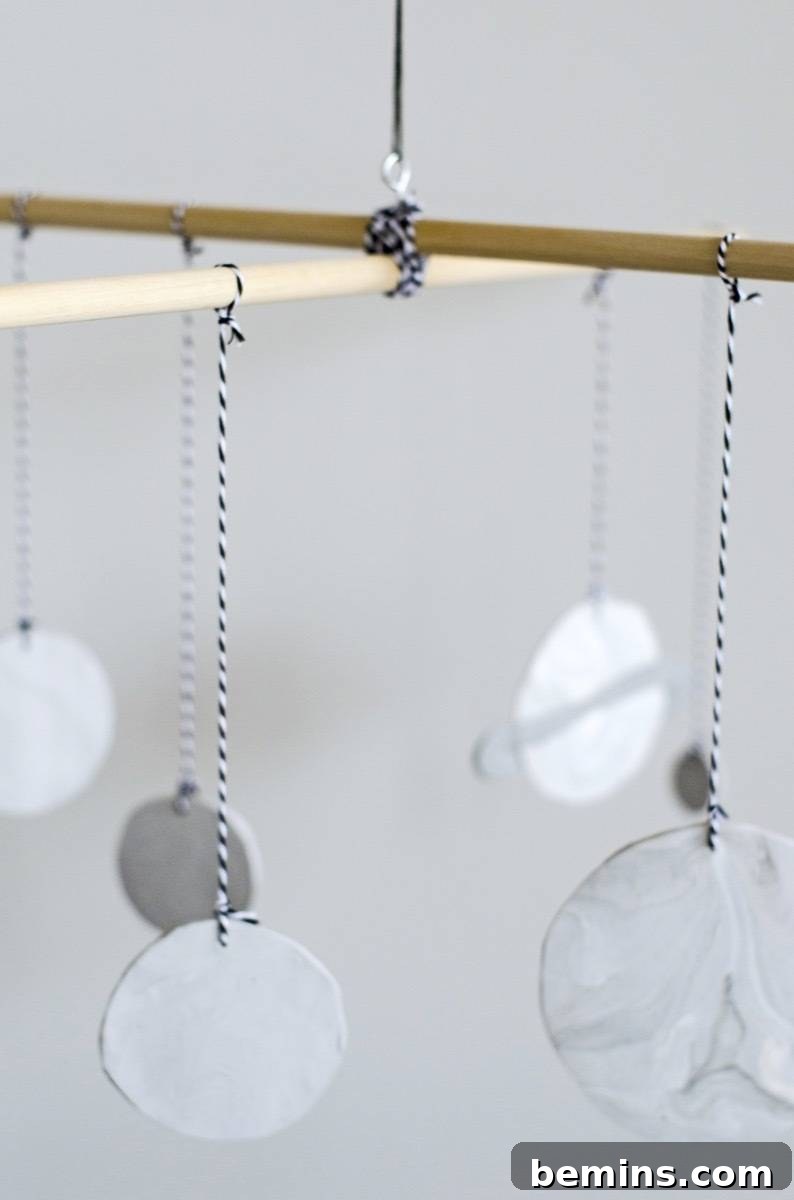 Crafting Cosmos: A Minimalist Nursery Mobile Project 12 Minimal Nursery DIY | Planetary Mobile
