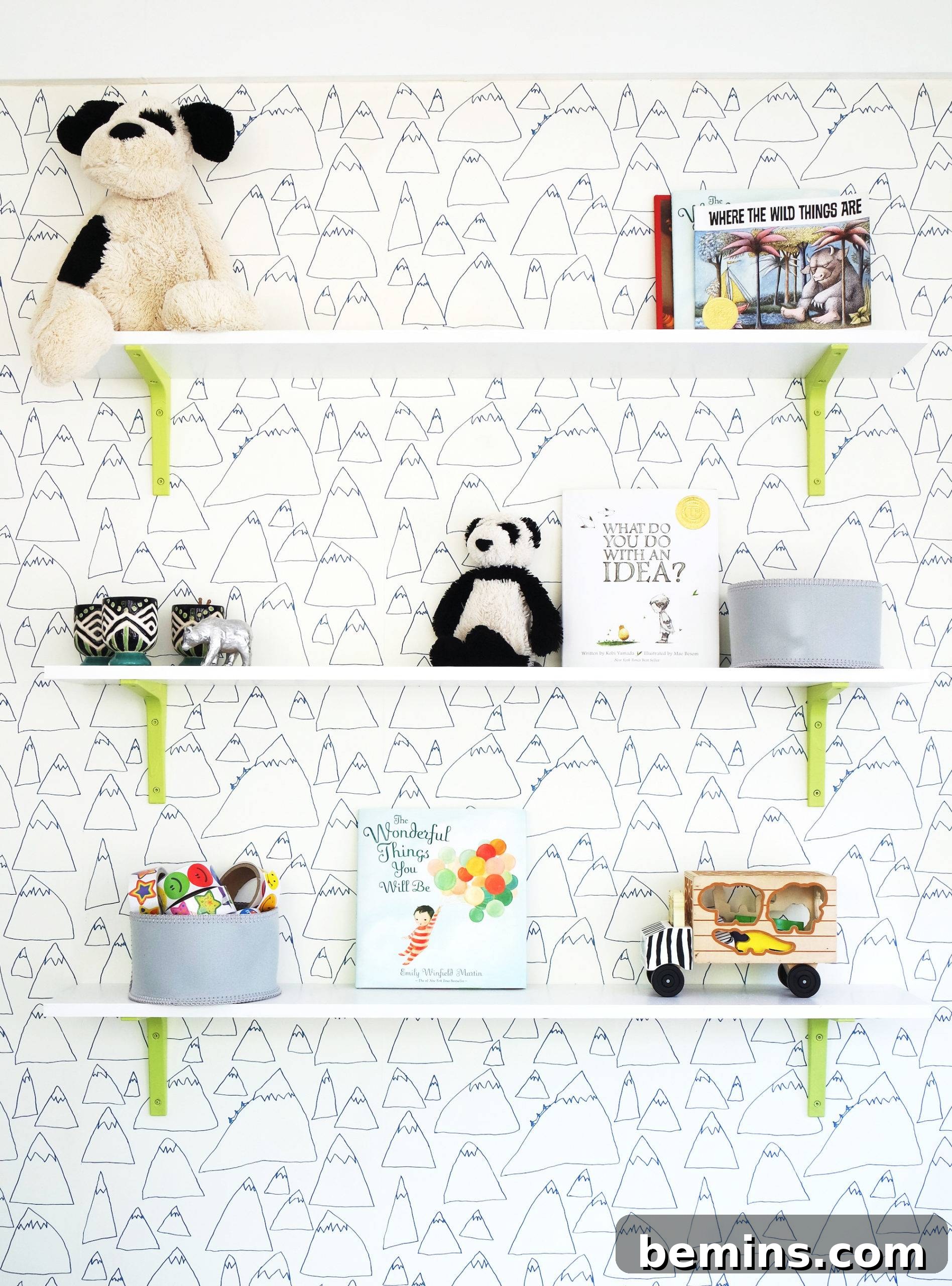 Pops of lime green pair will illustrative wallpaper create the perfect playroom. Click through to see the full reveal!