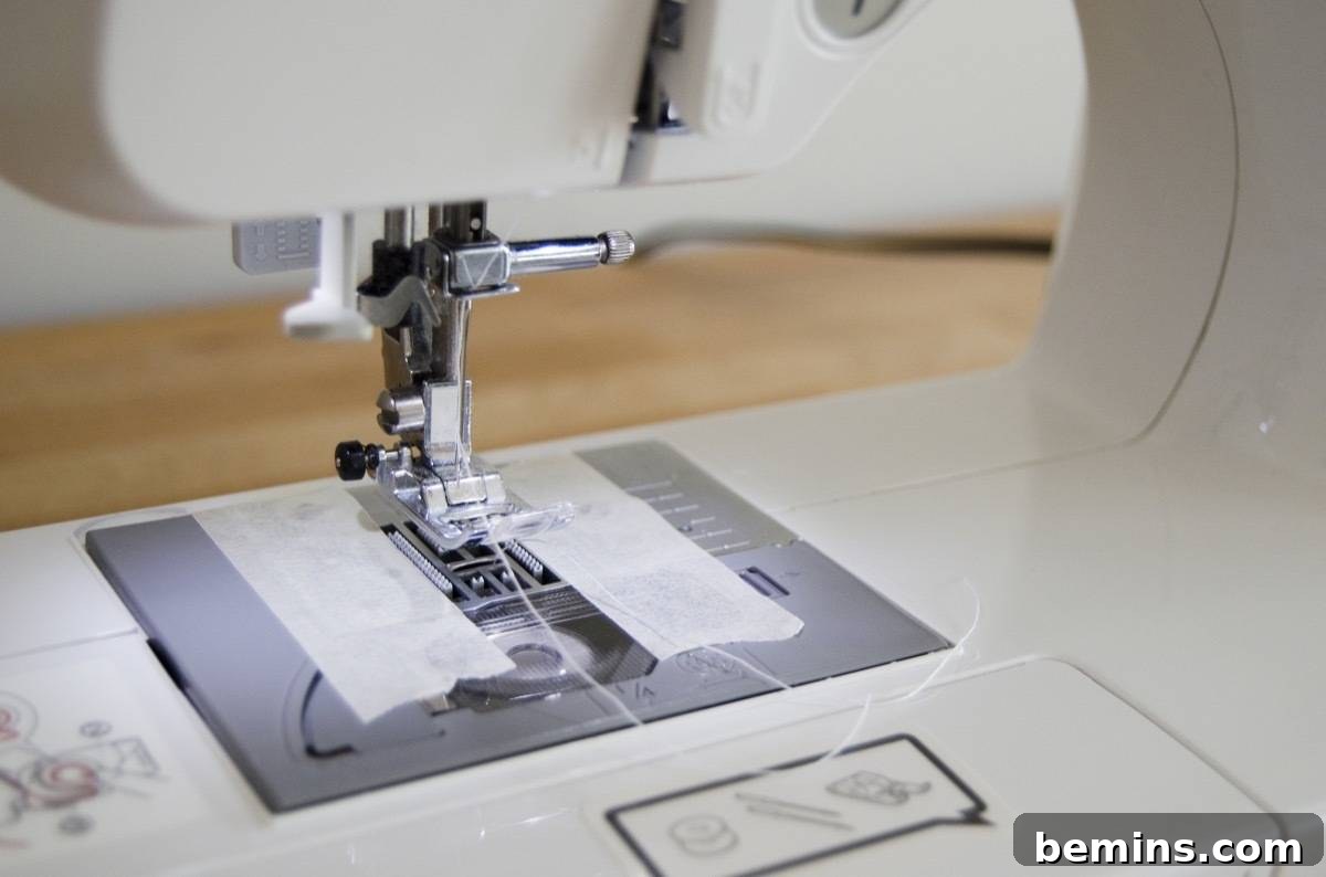 Using masking tape to help sew vinyl fabric smoothly
