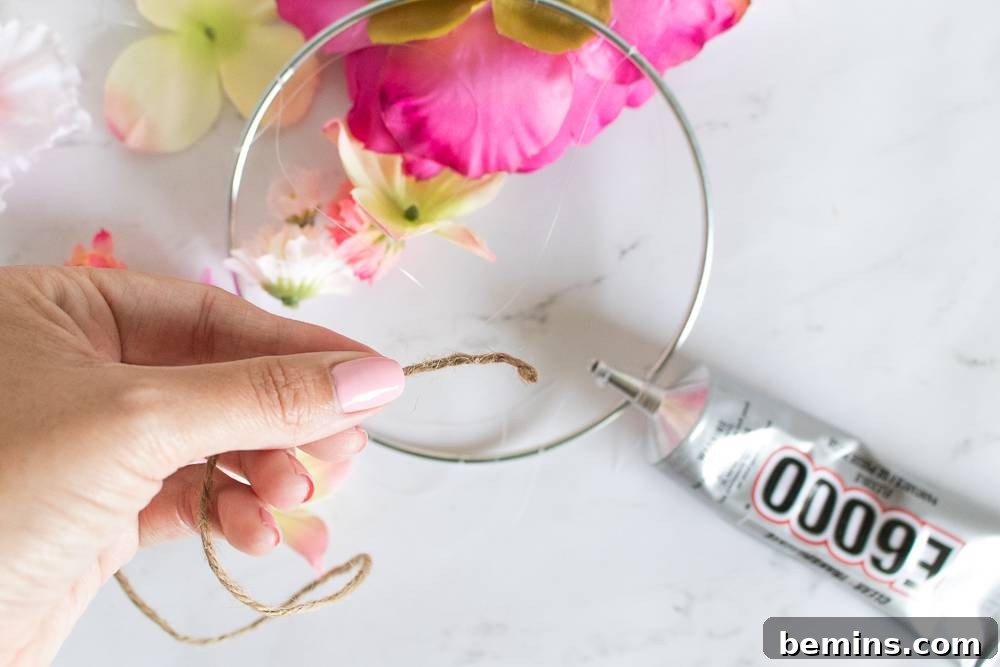 Attaching floral strands to the macrame hoop