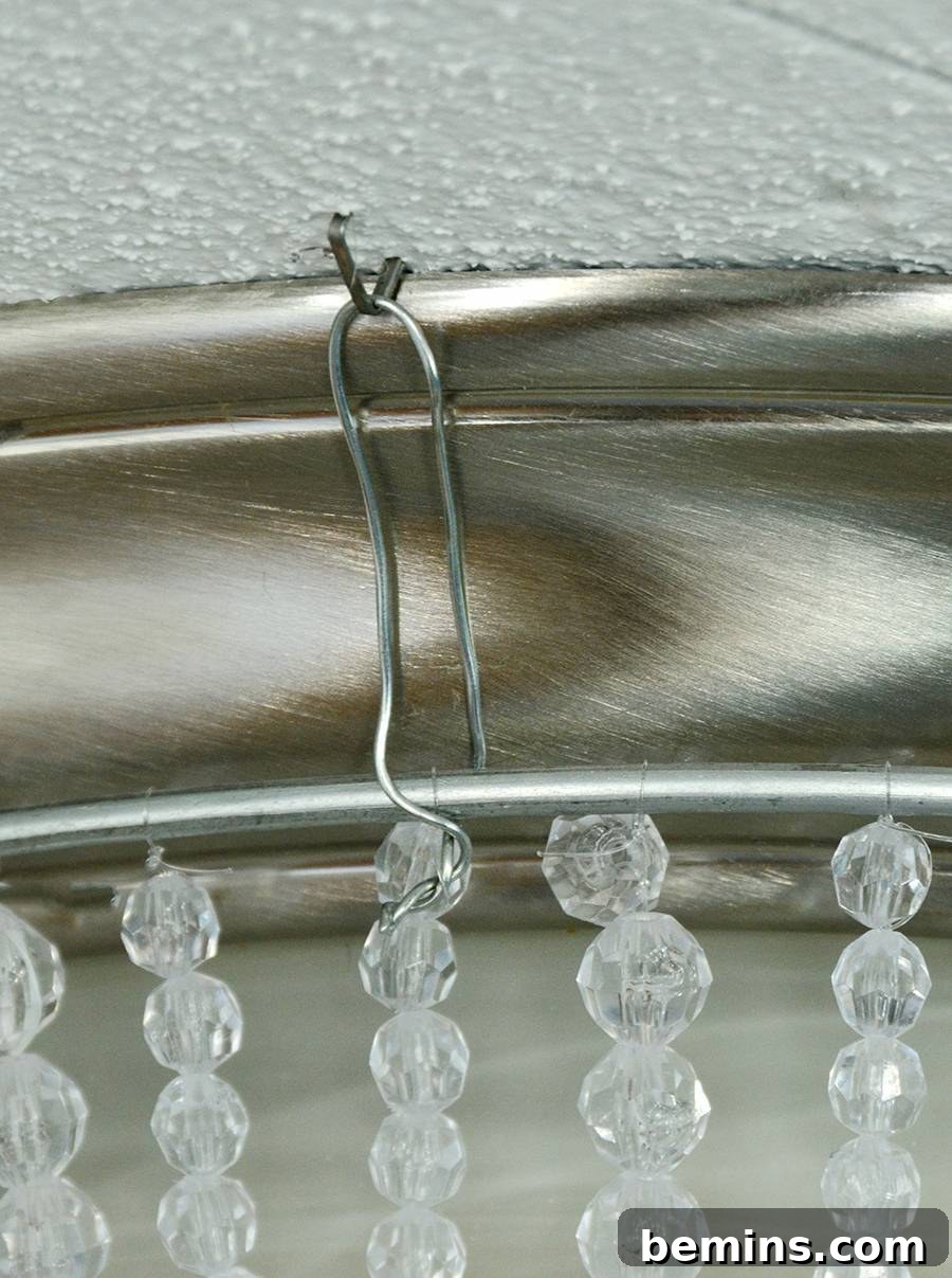 Securing the Beaded Hoop to the Boob Light
