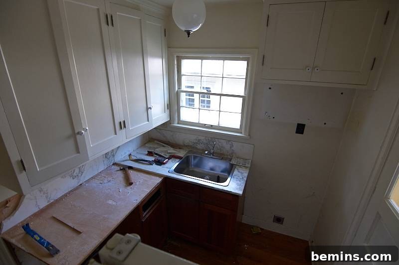 Minor Demolition: Curbly Home Renovation Kick-Off 7 Carpentry work during the kitchen demolition