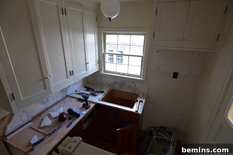 Minor Demolition: Curbly Home Renovation Kick-Off 8 A countertop in a white room