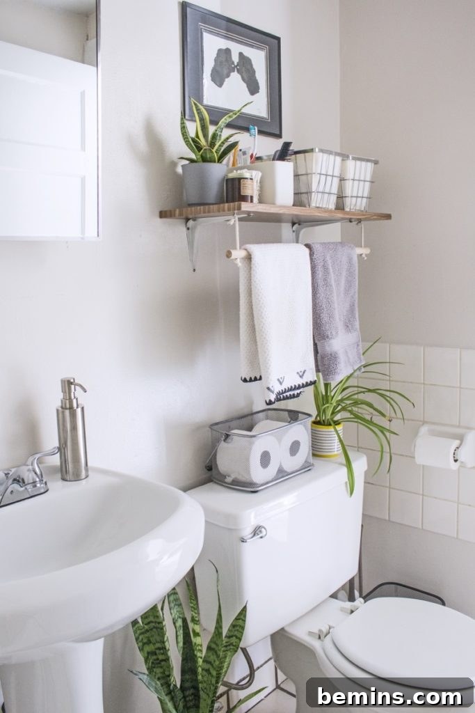 Apartment bathroom solutions: Use contact paper to dress up ugly shelving
