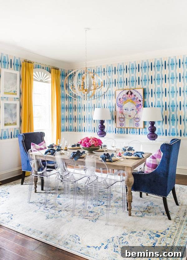 Dining room table with clear chairs and blue accents.