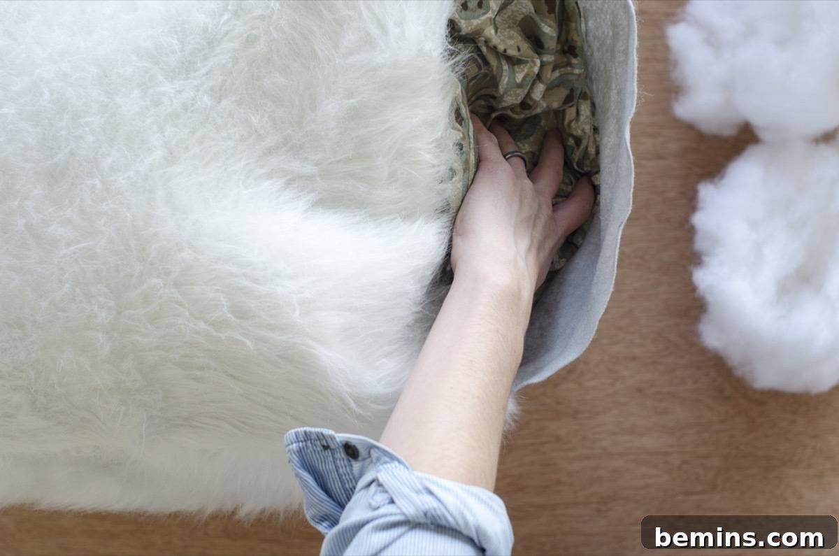 DIY Faux Fur Pouf on a Budget 9 Step 4: Filling the Faux Fur Pouf with Old Bedding