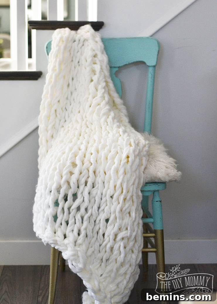 75 DIY Dorm Room Decor Ideas to Make It Your Own 20 Arm Knit Blanket