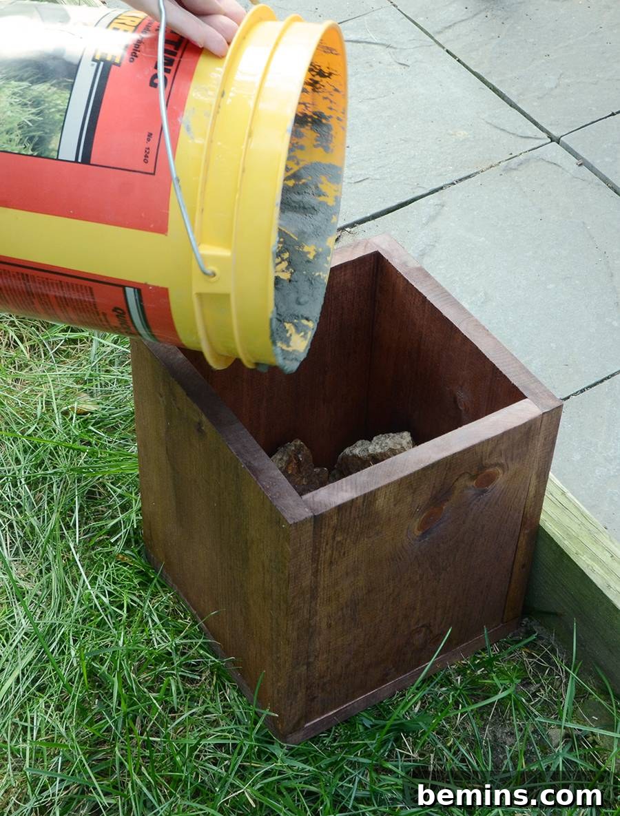 Inserting the post into the cement