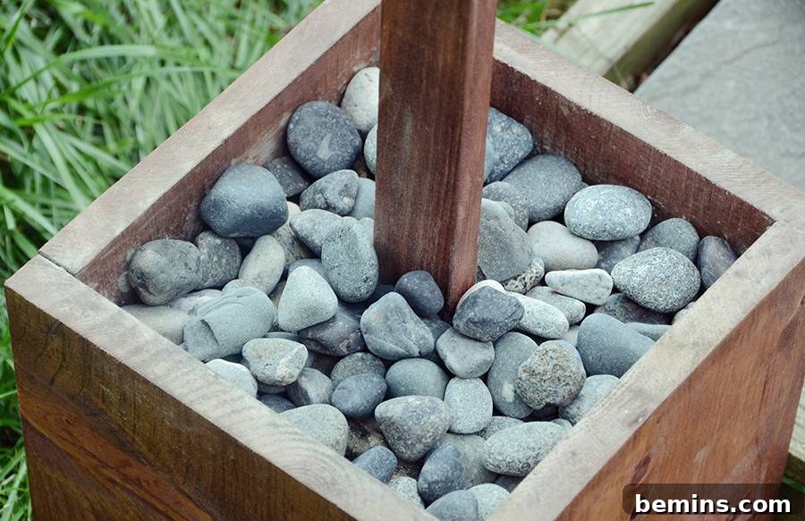 Adding rocks on top of the cement