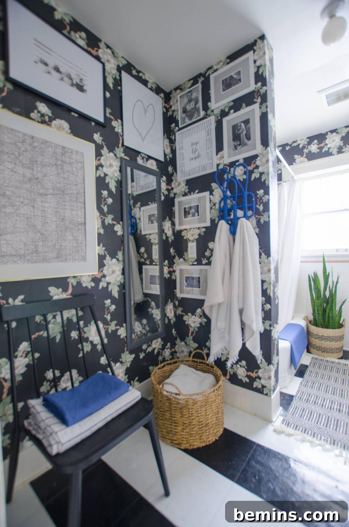 A gallery wall used to cover the patched wallpaper and light boxes.