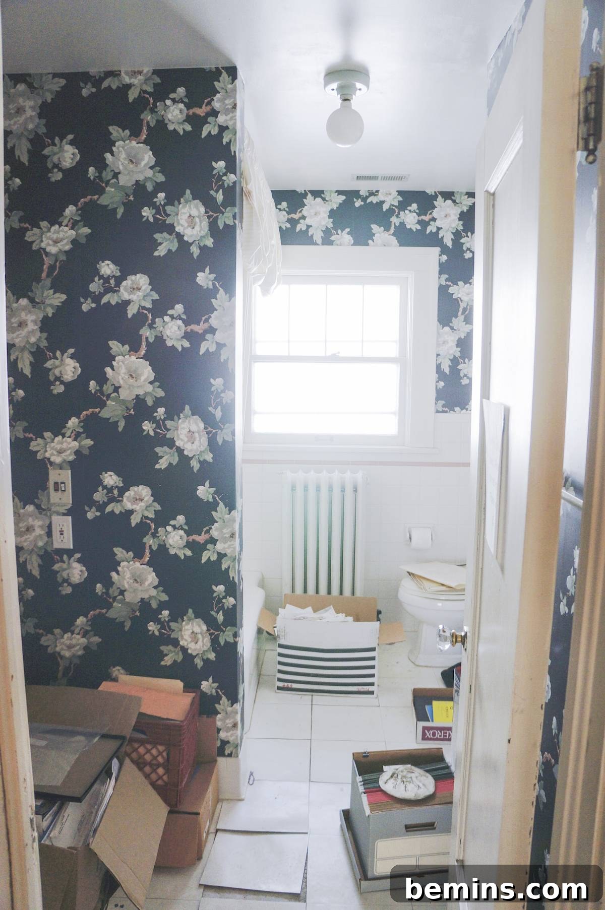 The bathroom's initial condition upon moving in, before any renovations.
