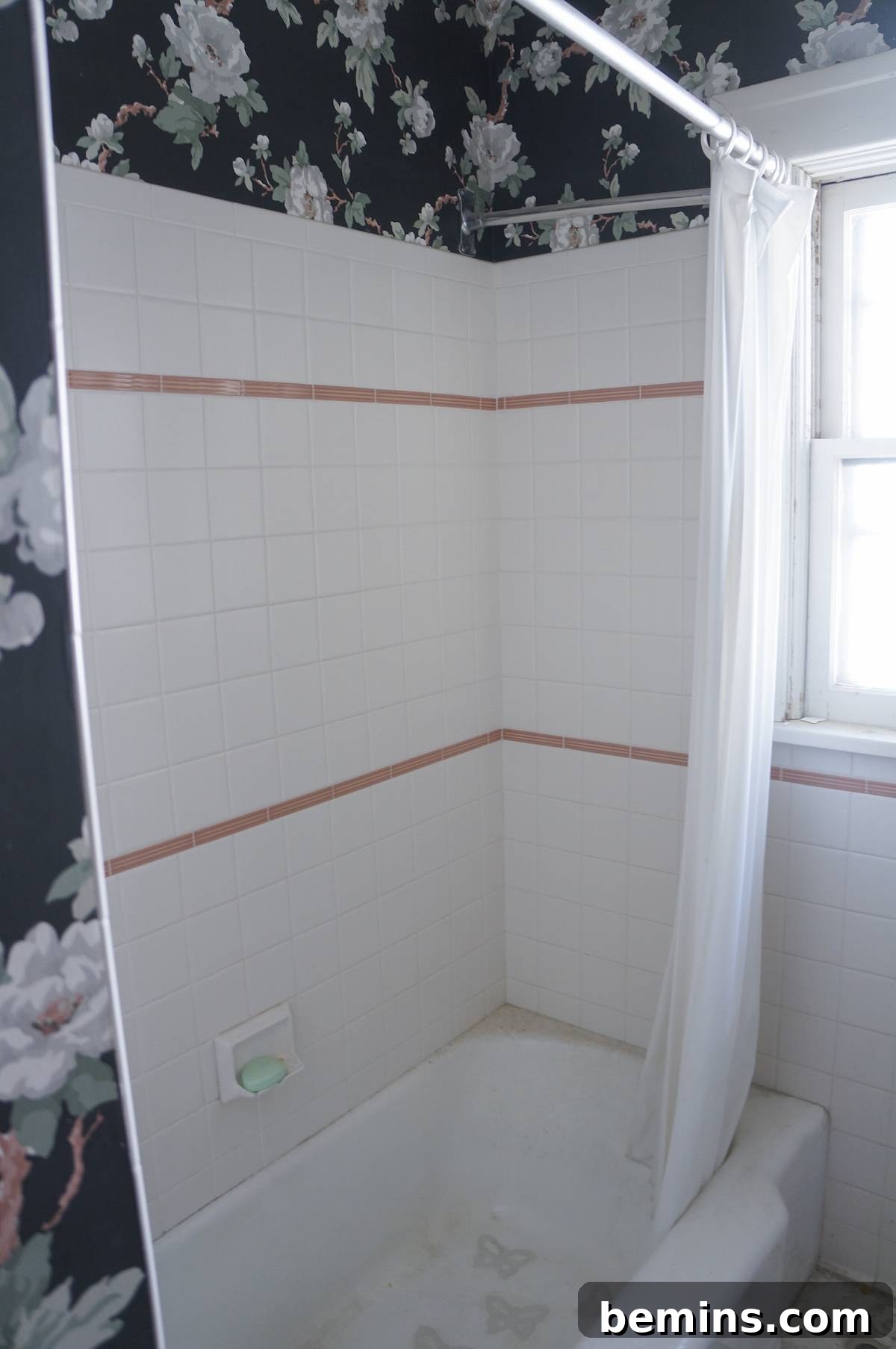 The bathtub after cleaning, revealing its surprisingly good condition.