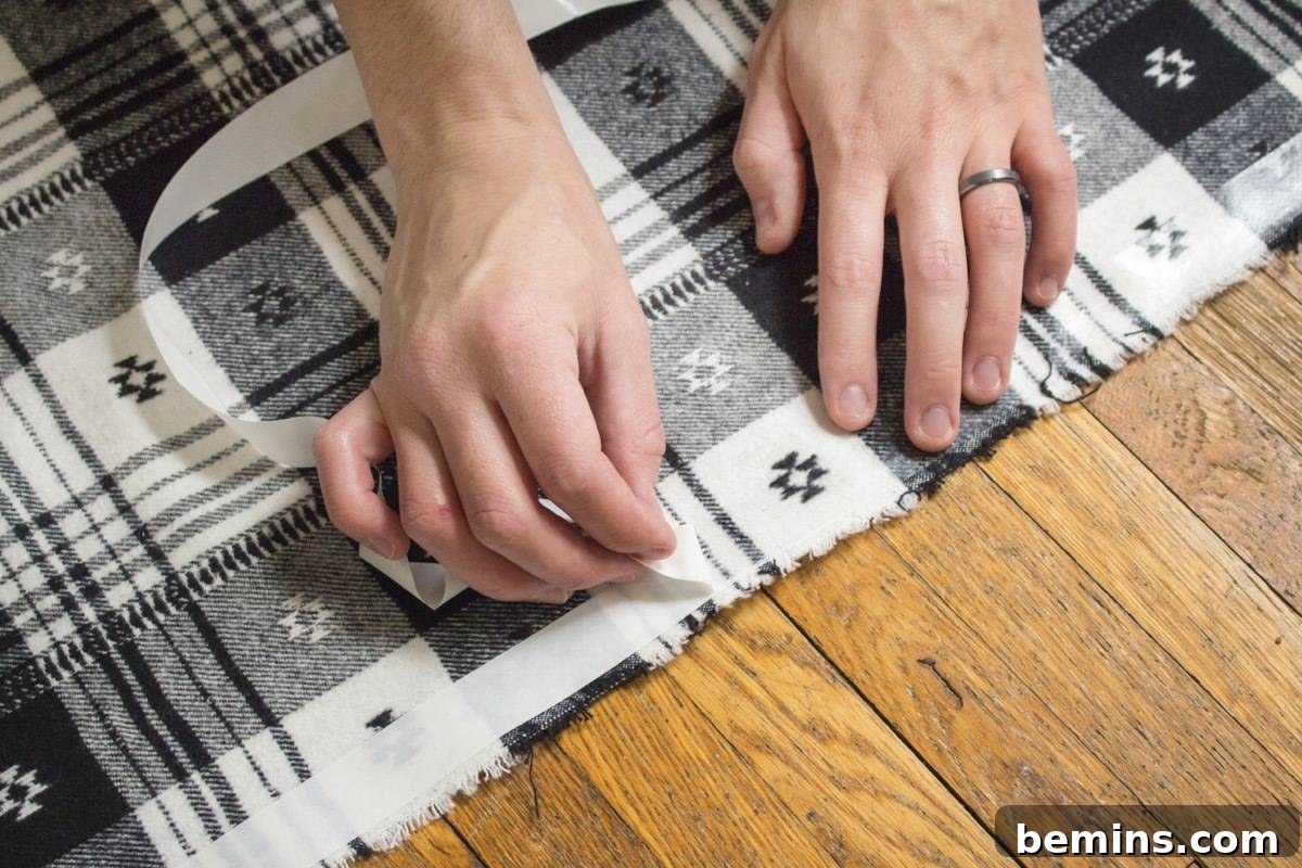 Remove Paper Backing From Hem Tape