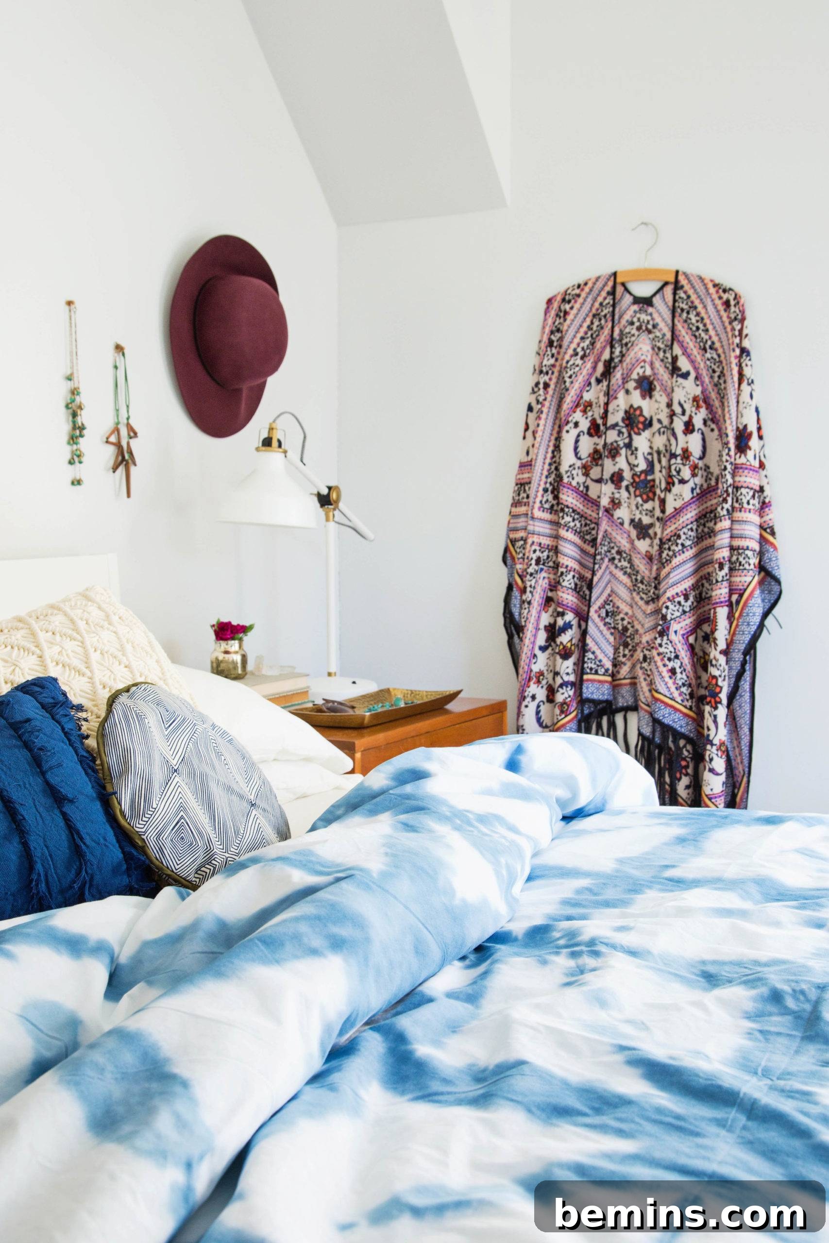15 Genius IKEA Bedroom Hacks for a Seasonal Home Update 12 A bed having blue and white colour bed sheet situated in a white coloured room