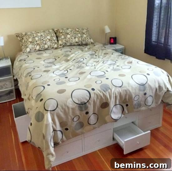 15 Genius IKEA Bedroom Hacks for a Seasonal Home Update 16 Small bed with a drawer compartment at its base sitting in a small bedroom with wood floors.