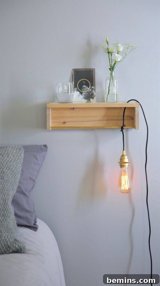 15 Genius IKEA Bedroom Hacks for a Seasonal Home Update 17 A light hangs down from a shelf near a bed.