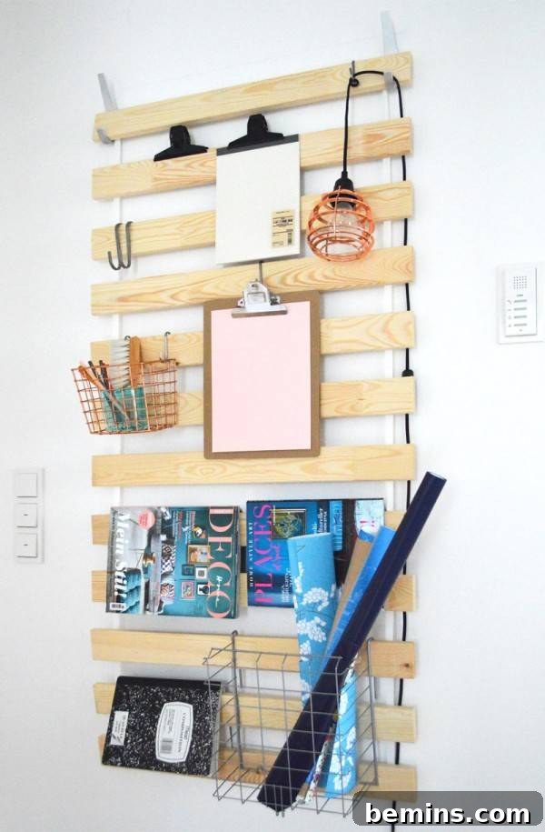 15 Genius IKEA Bedroom Hacks for a Seasonal Home Update 3 Wooden wall organizer with office related items resting on it.