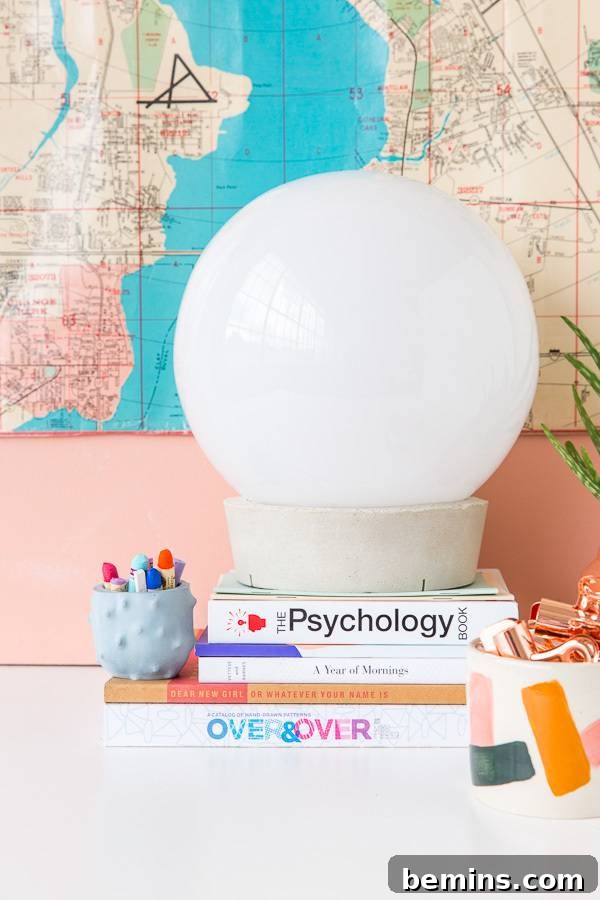 15 Genius IKEA Bedroom Hacks for a Seasonal Home Update 8 A map is positioned on the wall behind a table.