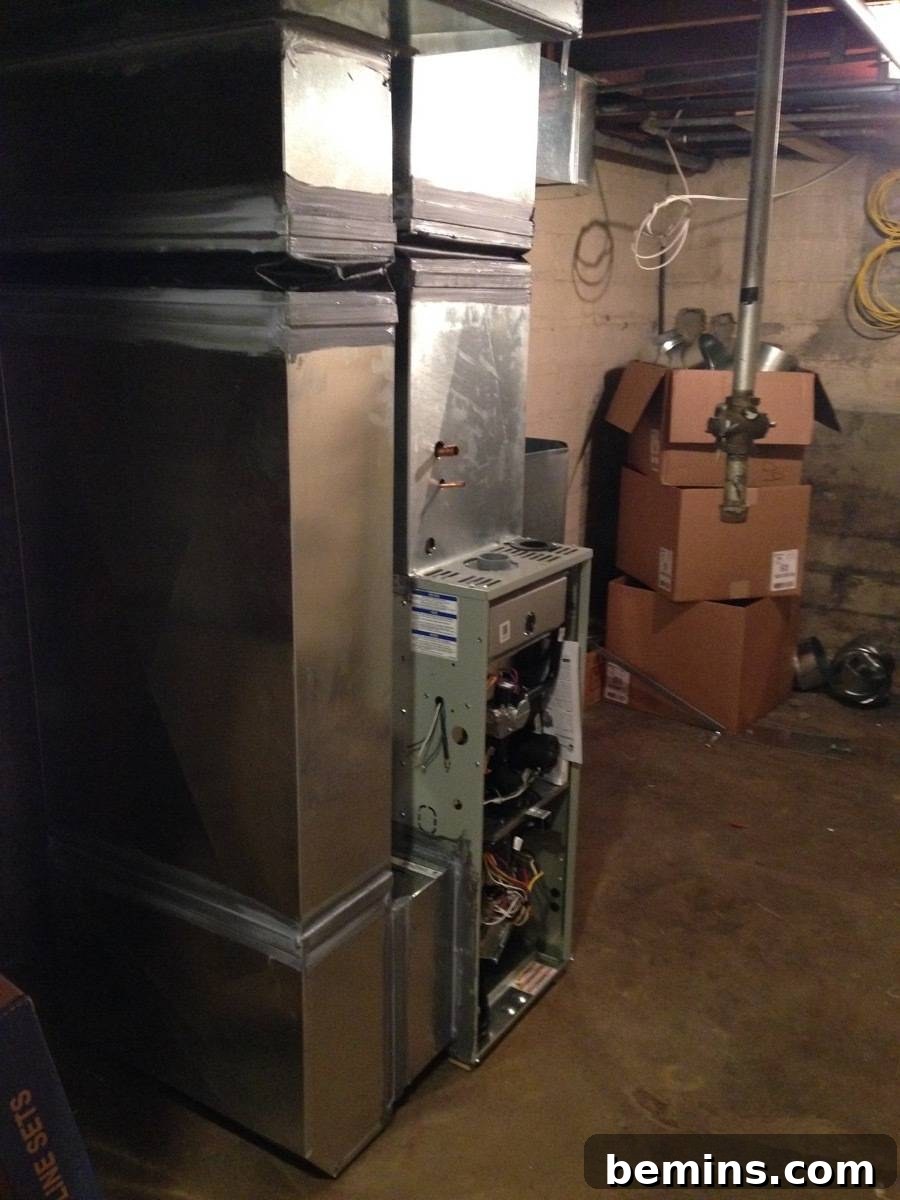A large silver appliance is sitting in a room.