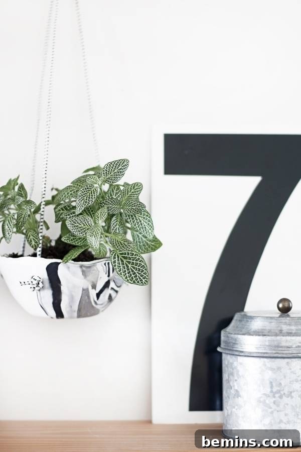 Discover how to make a chic marbled clay hanging planter