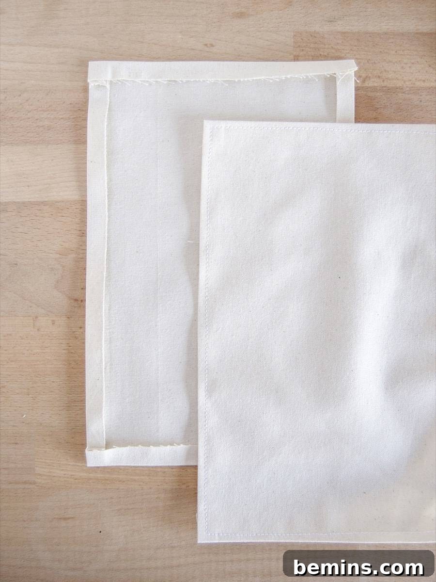 Hemming the edges of the fabric planter pockets for a clean finish