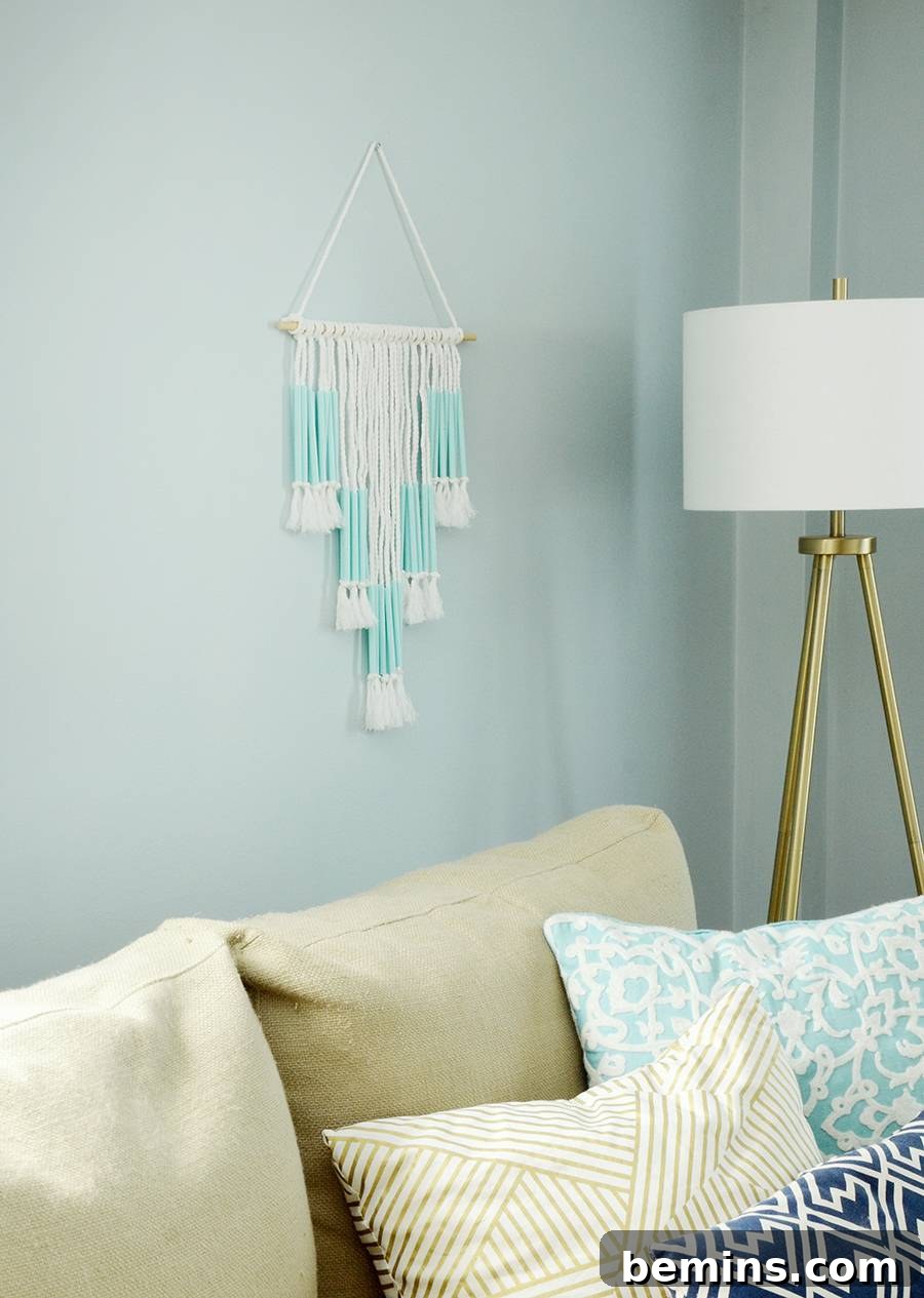 Finished DIY Plastic Straw and Rope Wall Hanging Displayed