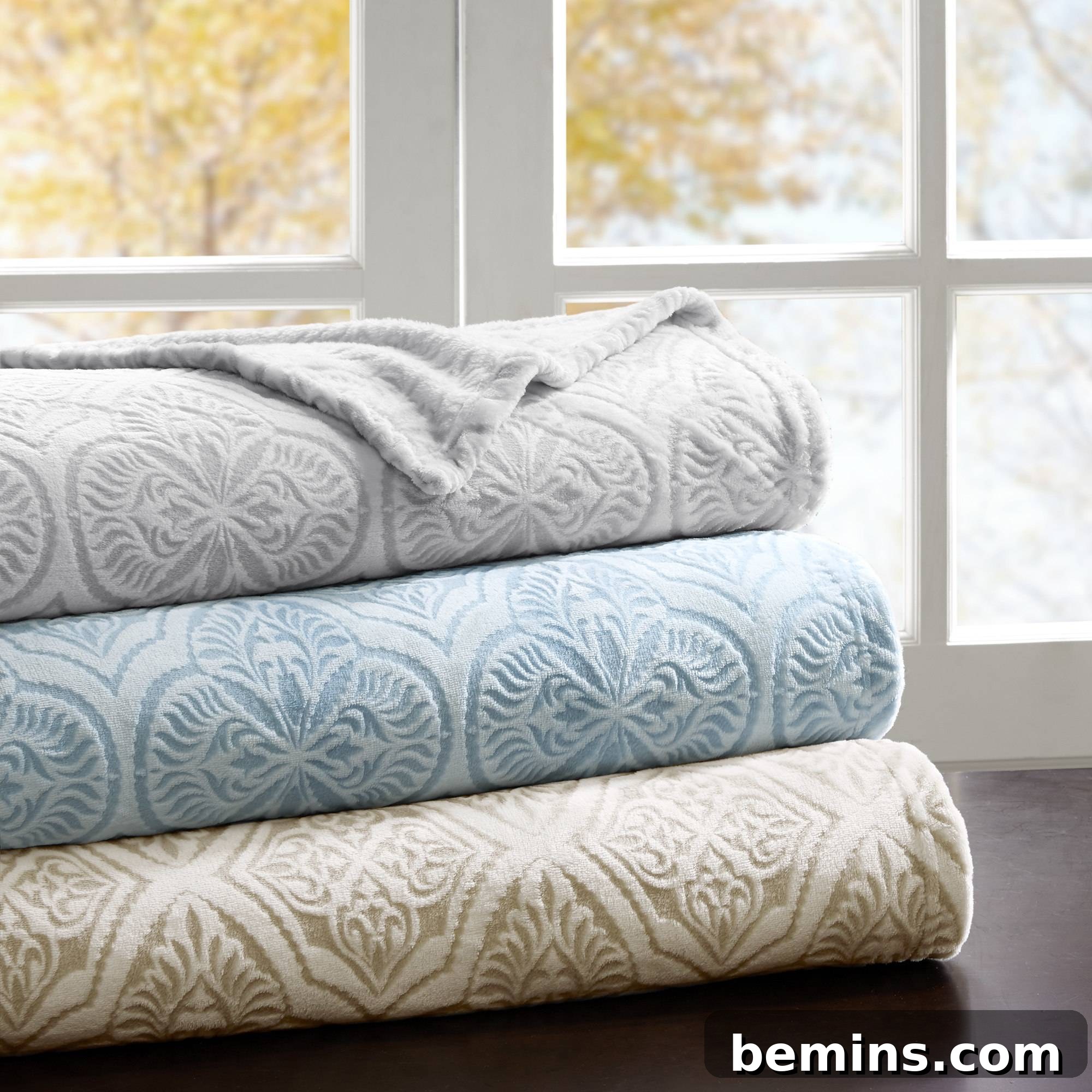 Chill Out in Style: The Ultimate Bedding Guide for Hot Sleepers 3 Madison Park Emma Printed Plush Blanket for Hot Sleepers